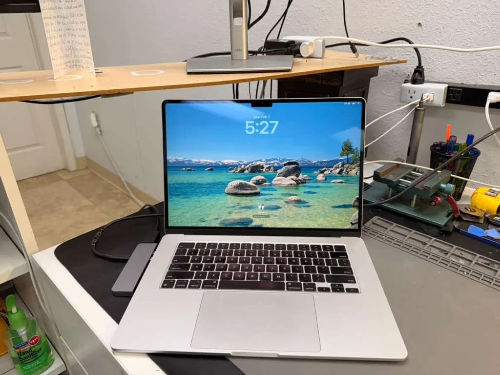 MacBook on a workbench during diagnostics at our Houston repair shop